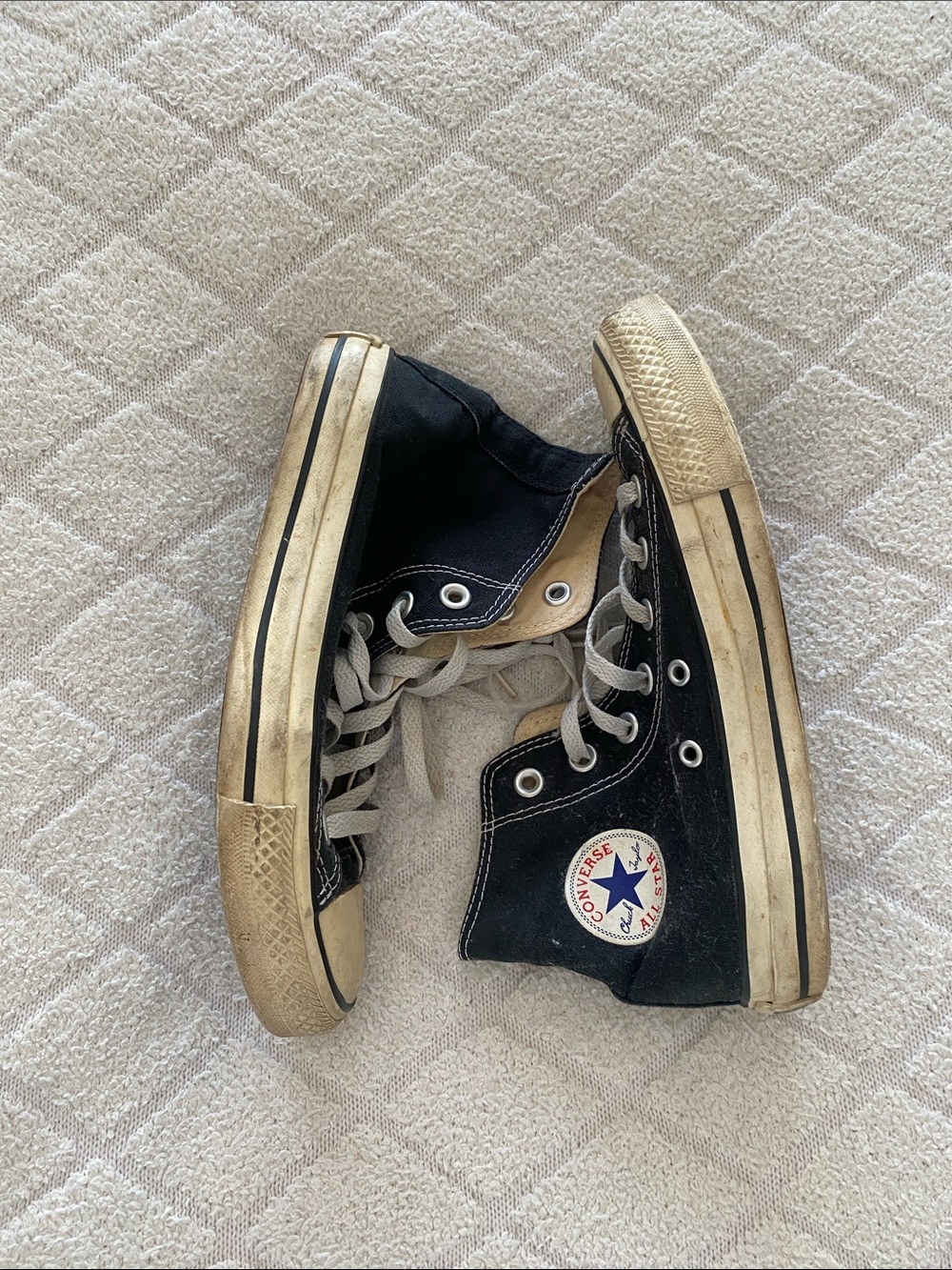Converse Chuck Taylor All Star High Top sneakers.